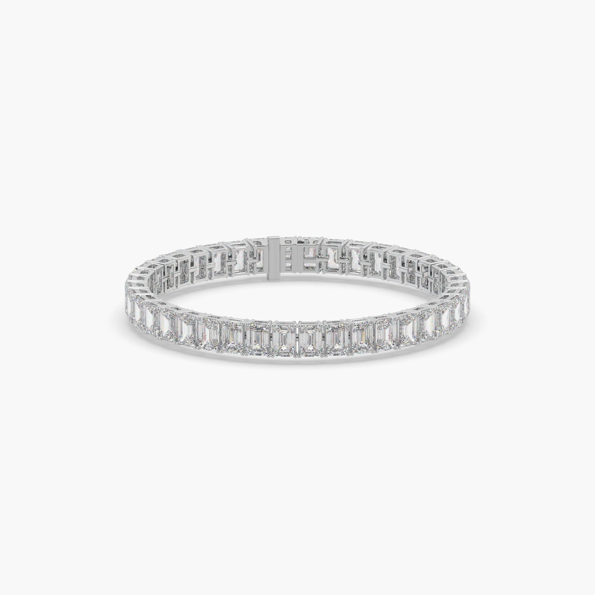Guru Jewel's Alluring Emerald Diamond Studded Silver Tennis Bracelet