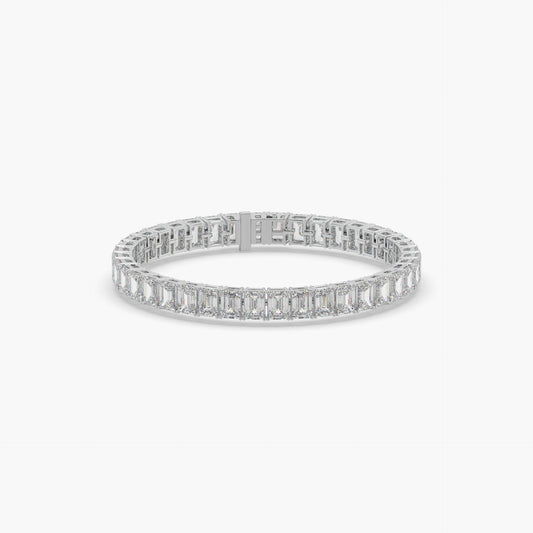 Guru Jewel's Alluring Emerald Diamond Studded Silver Tennis Bracelet