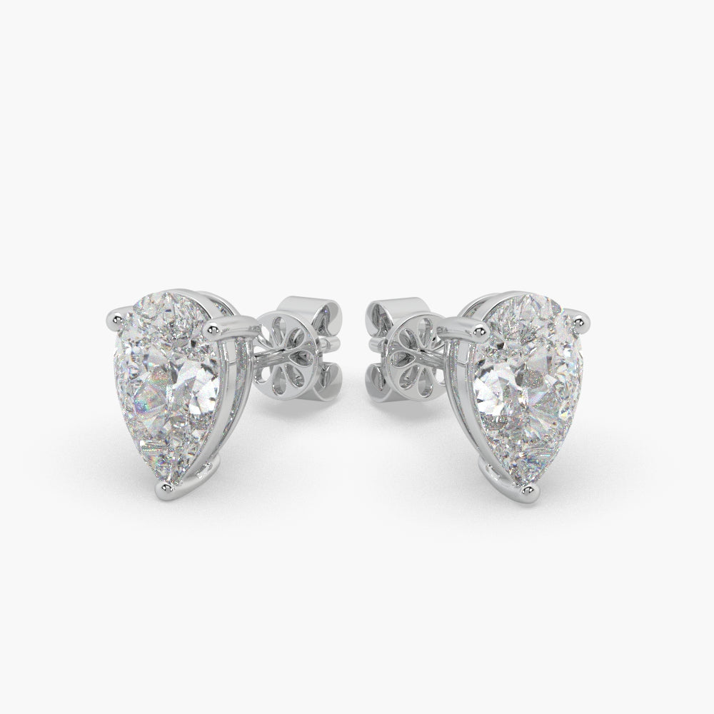 Guru Jewel's Pear Shaped Fancy Solitaire Studded In Silver Exclusive Earrings For Her