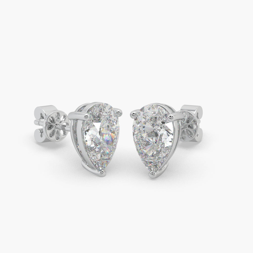 Guru Jewel's Pear Shaped Fancy Solitaire Studded In Silver Exclusive Earrings For Her