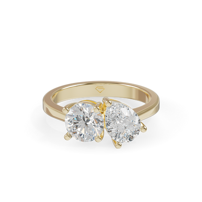 Guru Jewel's Asymmetric Round and Pear Solitaire Ring for Her