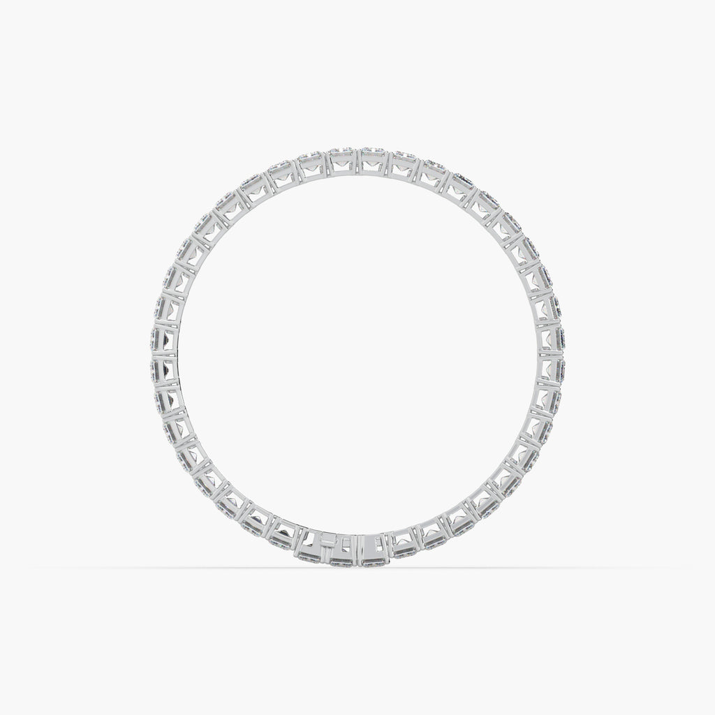 Guru Jewel's Alluring Emerald Diamond Studded Silver Tennis Bracelet