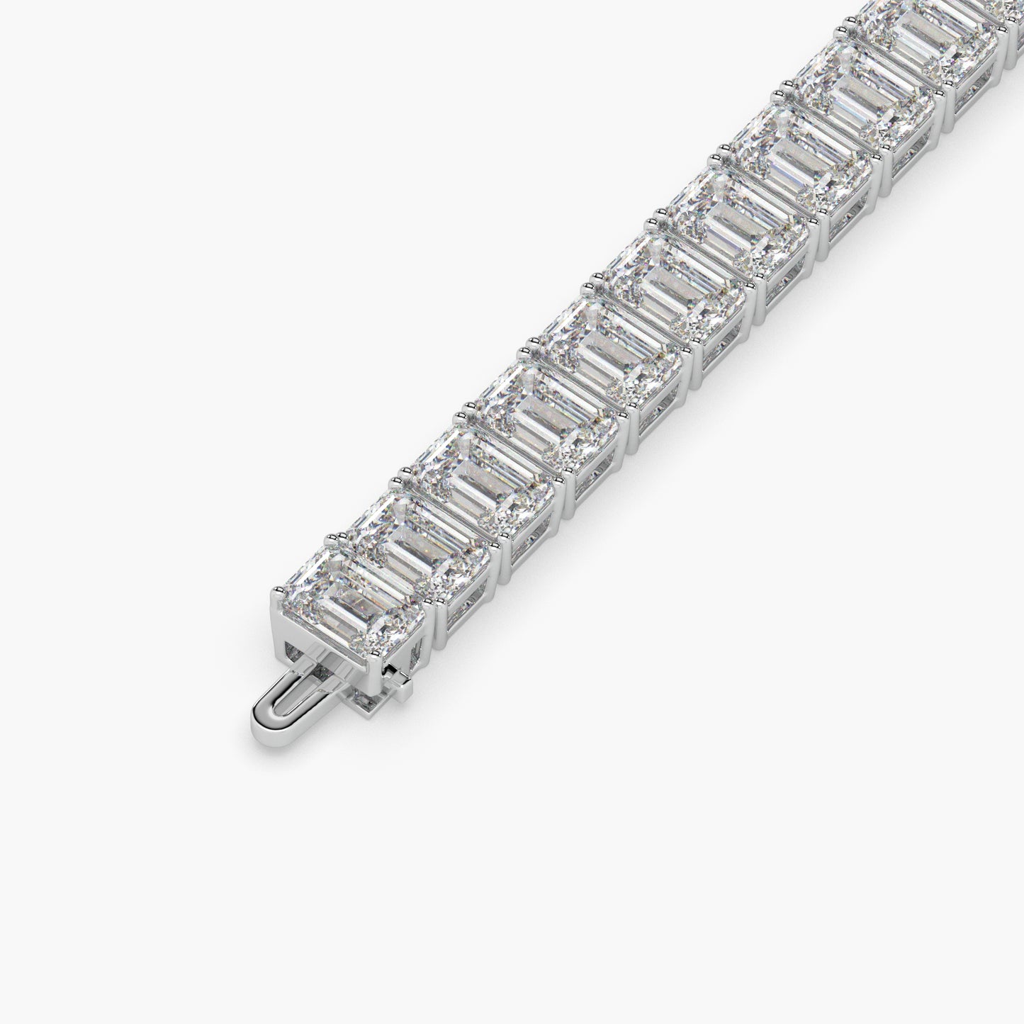 Guru Jewel's Alluring Emerald Diamond Studded Silver Tennis Bracelet