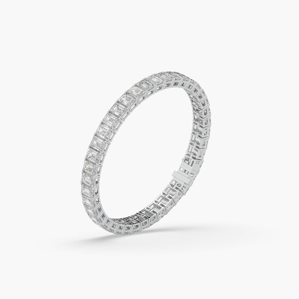 Guru Jewel's Alluring Emerald Diamond Studded Silver Tennis Bracelet