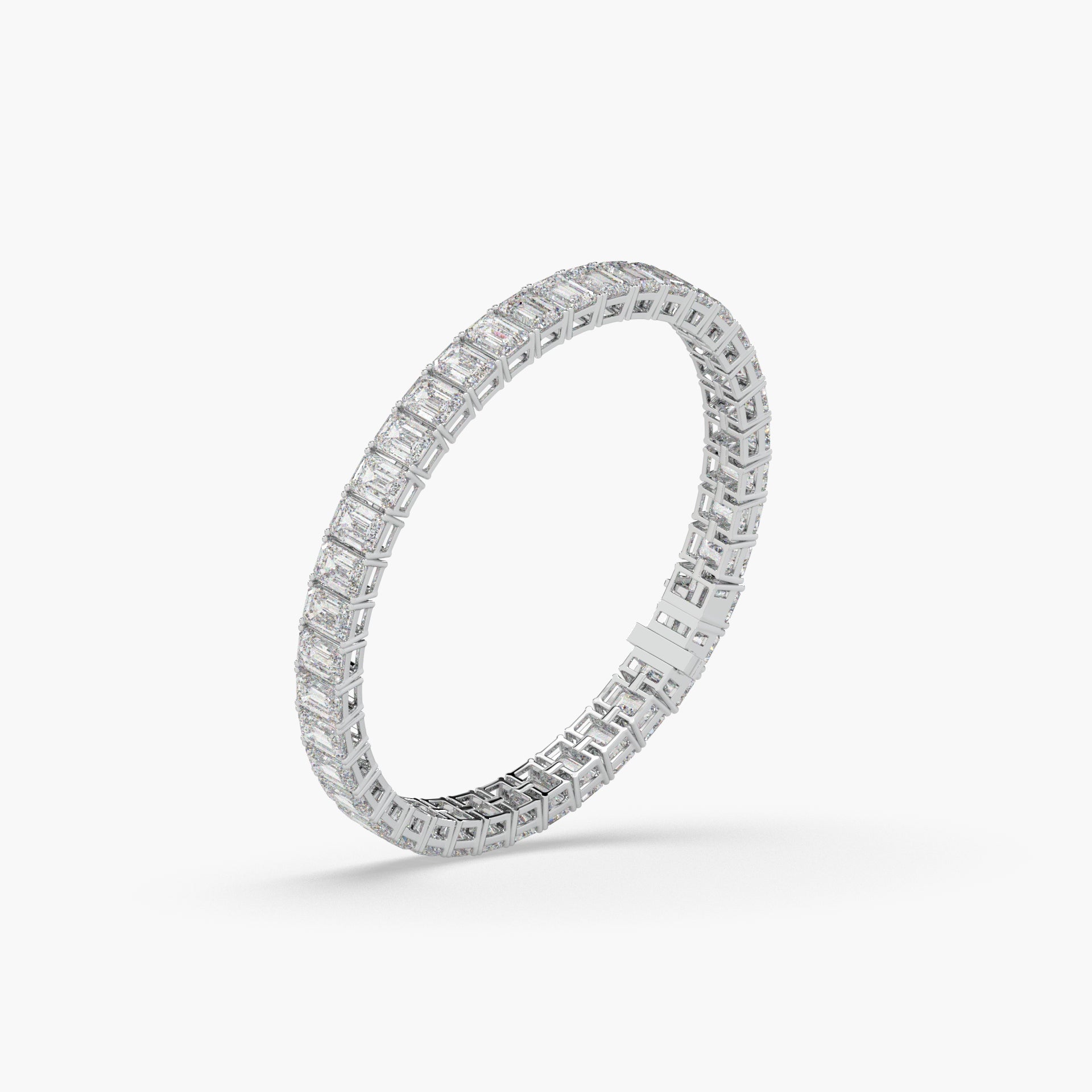 Guru Jewel's Alluring Emerald Diamond Studded Silver Tennis Bracelet