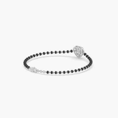 Guru Jewel's Alluring Diamond Studded Heart Shaped Silver Mangalsutra Bracelet For Her