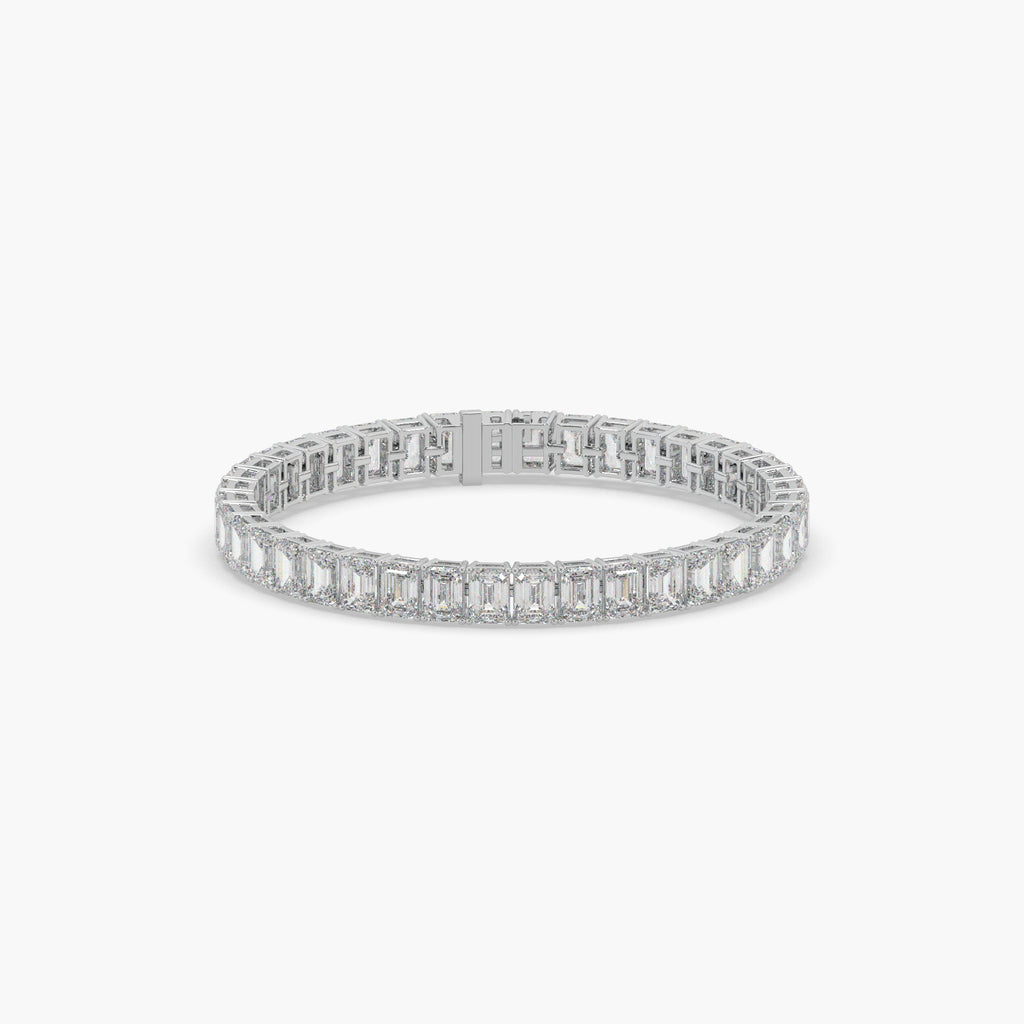 Guru Jewel's Alluring Emerald Diamond Studded Silver Tennis Bracelet
