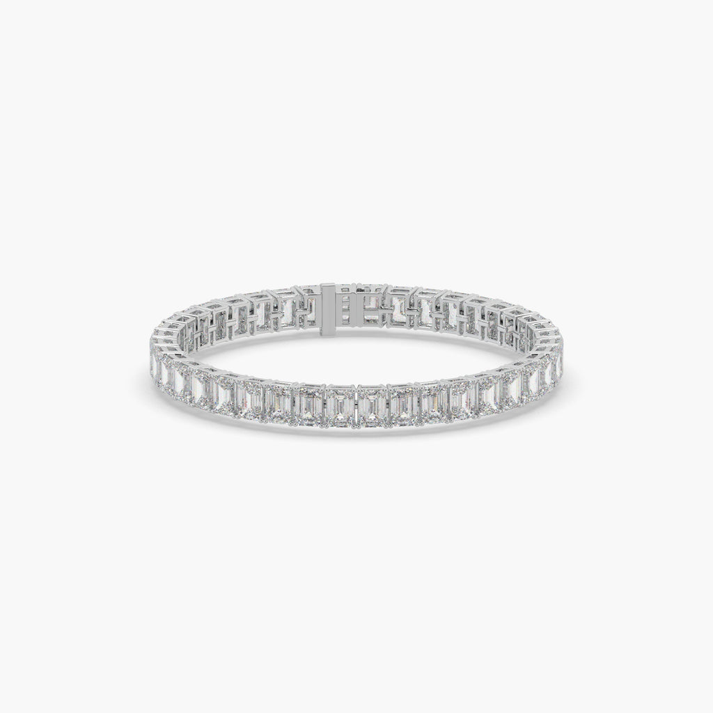 Guru Jewel's Alluring Emerald Diamond Studded Silver Tennis Bracelet