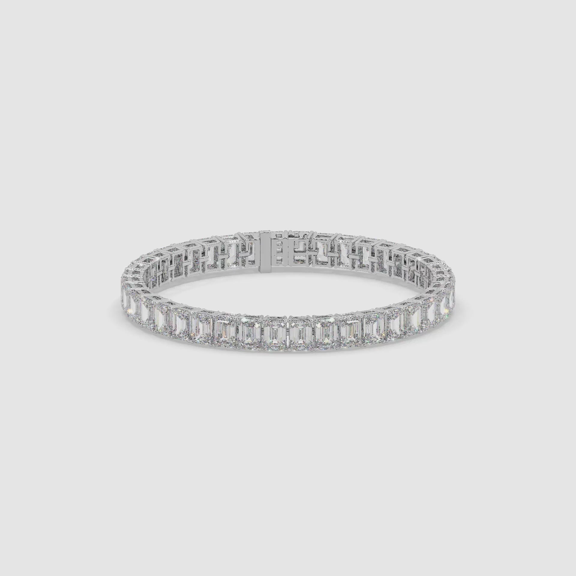 Guru Jewel's Alluring Emerald Diamond Studded Silver Tennis Bracelet